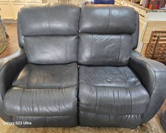 contemporary leather loveseat, reclining, cupholders