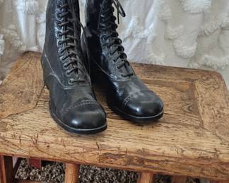 footstool and vintage women's boots
