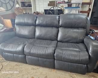 comfortable couch, reclines and cup holders
