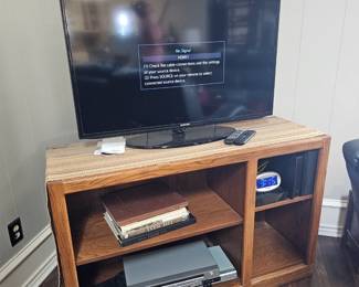 medium size flatscreen and entertainment center