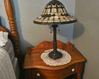 vintage nightstands with Tiffany-style lamp