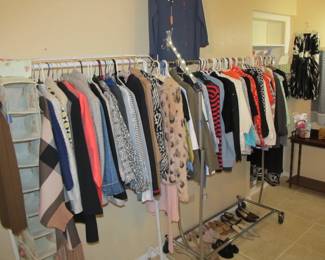 Ladies' boutique with blouses, tops, dresses, pants, casual items, jeans, designer purses, belts, shoes, hats, and more. We also have an incredible selection of cosmetics and more—as well as sewing items and a Singer Sewing Machine.