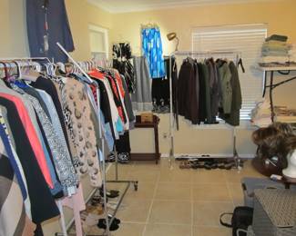 Ladies' boutique with blouses, tops, dresses, pants, casual items, jeans, designer purses, belts, shoes, hats, and more. We also have an incredible selection of cosmetics and more—as well as sewing items and a Singer Sewing Machine.