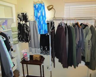 Ladies' boutique with blouses, tops, dresses, pants, casual items, jeans, designer purses, belts, shoes, hats, and more. We also have an incredible selection of cosmetics and more—as well as sewing items and a Singer Sewing Machine.