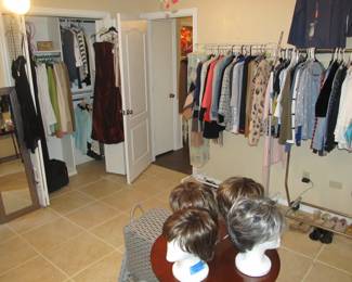 Ladies' boutique with blouses, tops, dresses, pants, casual items, jeans, designer purses, belts, shoes, hats, and more. We also have an incredible selection of cosmetics and more—as well as sewing items and a Singer Sewing Machine.