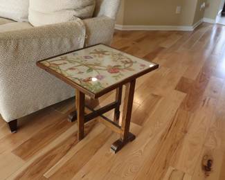  FOLDING EMBROIDERED TOP MAHOGANY TABLE/FIRE SCREEN.