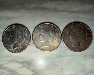 1923 and 1922 s silver peace dollars