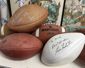 Signed Footballs By- Jerry Kramer, Roger Staubach, and Fran Tarkenton