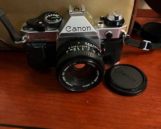 F30 - $100. Canon AE-1. 