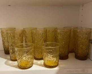 F25 - $50. Vintage Glass LOT. Amber glasses, clear glasses with dot pattern, green glass. 