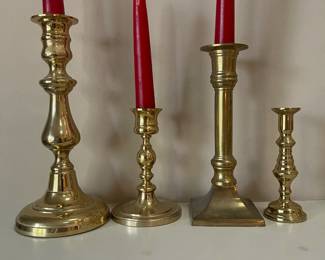 F5 - $30. Lot of Brass Candlesticks. 4 Carolina Brass the rest are unmarked. 