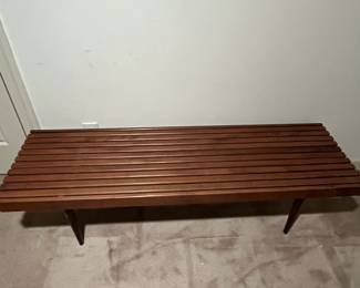 F63 - $300. Mid Century Slot Bench - Made in Yugoslavia. Measures 60" x 18" x 15.25" tall. Sturdy and in very good condition!
