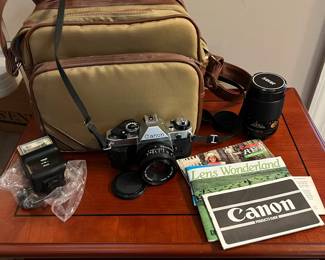 F30 - $100. Canon AE-1. 