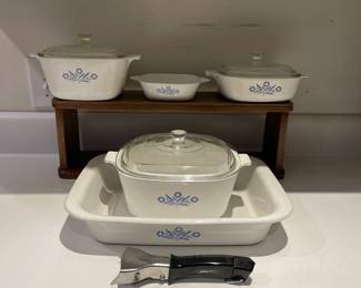 F22 - $60. Corningware LOT with handle. 5 Baking Dishes, 3 lids, handle. Significant scratches on 2nd smallest one. 