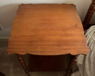 F68 - $50. Wooden Side Table with Barley Twist Legs. Measures 24.25" square x 29.5" tall. Top is veneer. Overall good condition - a little wiggly. 