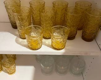 F25 - $50. Vintage Glass LOT. Amber glasses, clear glasses with dot pattern, green glass. 