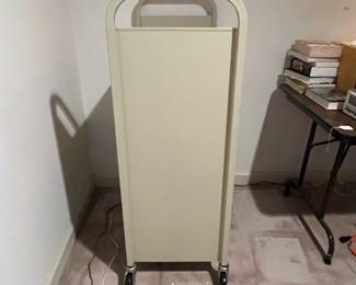 F62 - $250. Industrial Rolling Library Cart. Measures 31" x 17" x 47.25" tall. 