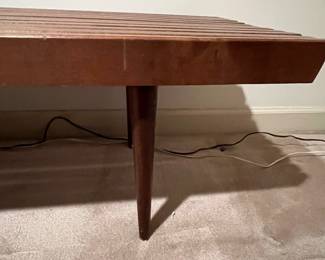 F63 - $300. Mid Century Slot Bench - Made in Yugoslavia. Measures 60" x 18" x 15.25" tall. Sturdy and in very good condition!