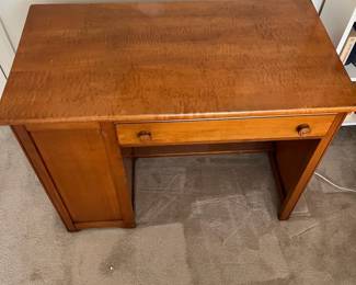 F88 - $50. Vintage Solid Wood Desk. Measures 39" wide x 21" deep x 29" tall. Has bookcase on the side