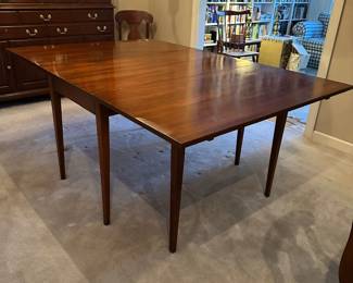F7 - $750. Henkel-Harris Co.  Solid Wild Black Cherry. Drop Leaf Table. Style # 2123. Includes 4 chairs. Measures 44" wide x 6' long. 29" tall. 24" with the leaves down. Very good vintage condition - was always used with the table pads on it. 