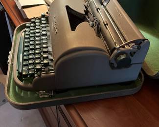 F6 - $65. Remington Quiet-Riter in case. 