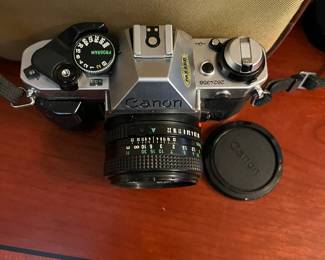 F30 - $100. Canon AE-1. 