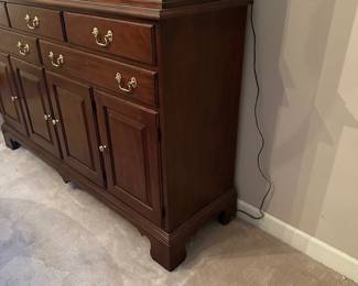 F8 - $950. Henkel-Harris China Cabinet. Moves in 2 pieces. Measures 5' wide x 17" deep x 79" tall. Base is 37". Top is 42". 