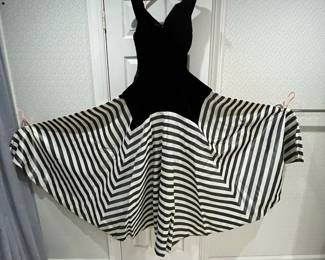 F28 - $100. 1950's Ball Gown. Handmade from a pattern. Width is 25". Pit to Pit is 32-33". Excellent Condition!