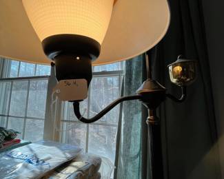 F85 - $60. Tole Painted Adjustable Floor Lamp. 56" tall. Metal with a metal shade. 