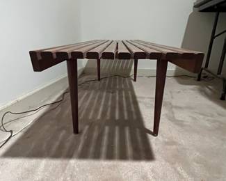 F63 - $300. Mid Century Slot Bench - Made in Yugoslavia. Measures 60" x 18" x 15.25" tall. Sturdy and in very good condition!