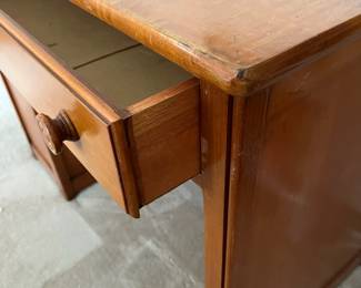 F88 - $50. Vintage Solid Wood Desk. Measures 39" wide x 21" deep x 29" tall. Has bookcase on the side
