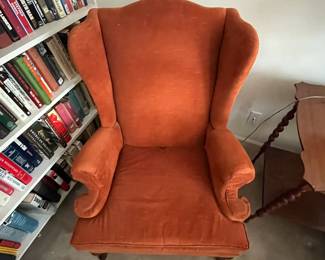 F82 - $40. Orange Upholstered Chair. Atlantic Interiors LTD. Measures 32" wide x 42" tall x 30" deep. Upholstery is in good condition!