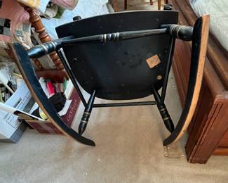 F84 - $60. Tell City Chairs Black Rocker. Tole Painted Black & gold. Measures 22" wide x 39" tall x 28.5" deep. 