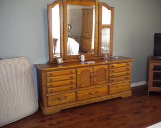 Matching triple dresser and bi-fold mirror
