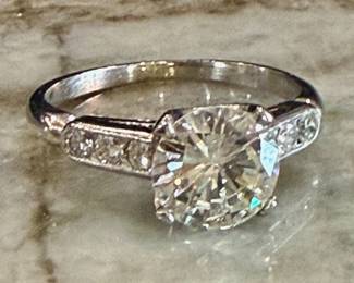 1.55 Carat VS2 clarity G color plus 6 VS G color side stones .20 TCW