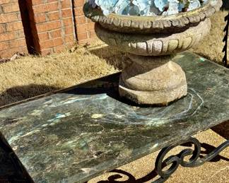 Calcutta table and large concrete urn