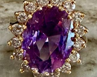 Large 6/5 tone saturation amethyst and .96 carats SI clarity G color diamonds