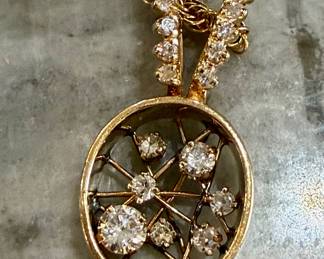 .62 carat TW IS1 G clarity pendant in heavy gold with chain