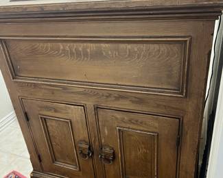 Old-fashioned refrigerator. Put your big block of ice in the top and keeps your items cold below.!