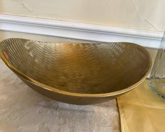 Super nice big gold bowl. Use as is or put other decorator items inside.
