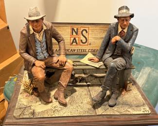 1977 collectible sculpture titled "Two men on a bench" by artist Michael Garman.   At auction these draw up to $400.  $75