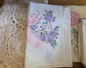 Vintage needlepoint pillow cases and dresser scarves