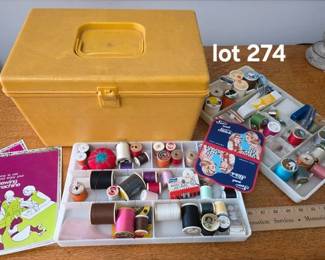 Vintage sewing box with thread and notions