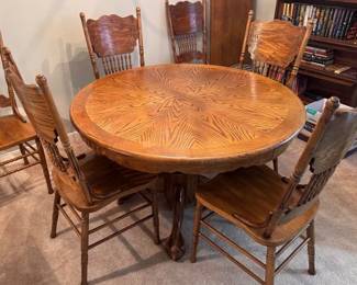 Oak dining table with leaf and 6 chairs