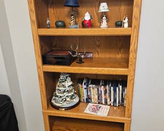 3 matching tall wooden book cases