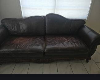 I have this leather sofa available at another home, dark brown leather distressed look $150