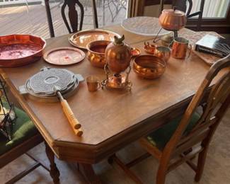 Rustic wood table with two leaves, four chairs.  Great project piece!