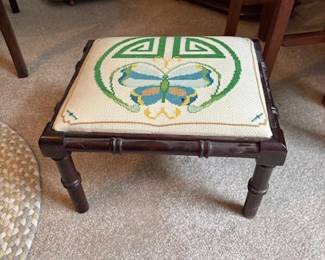Needlepoint covered stool