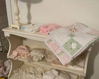 Wonderful bookcase available as well as the sweet vintage baby linens