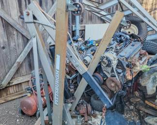 Engine hoists, engines, and engine parts